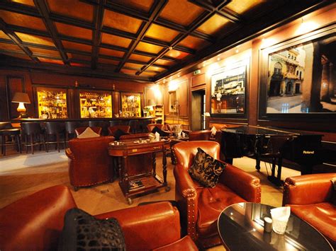 "TVs, so it was a bonus to sit out there on a beautiful evening and enjoy with our food and cigars. . Cigar bar near me